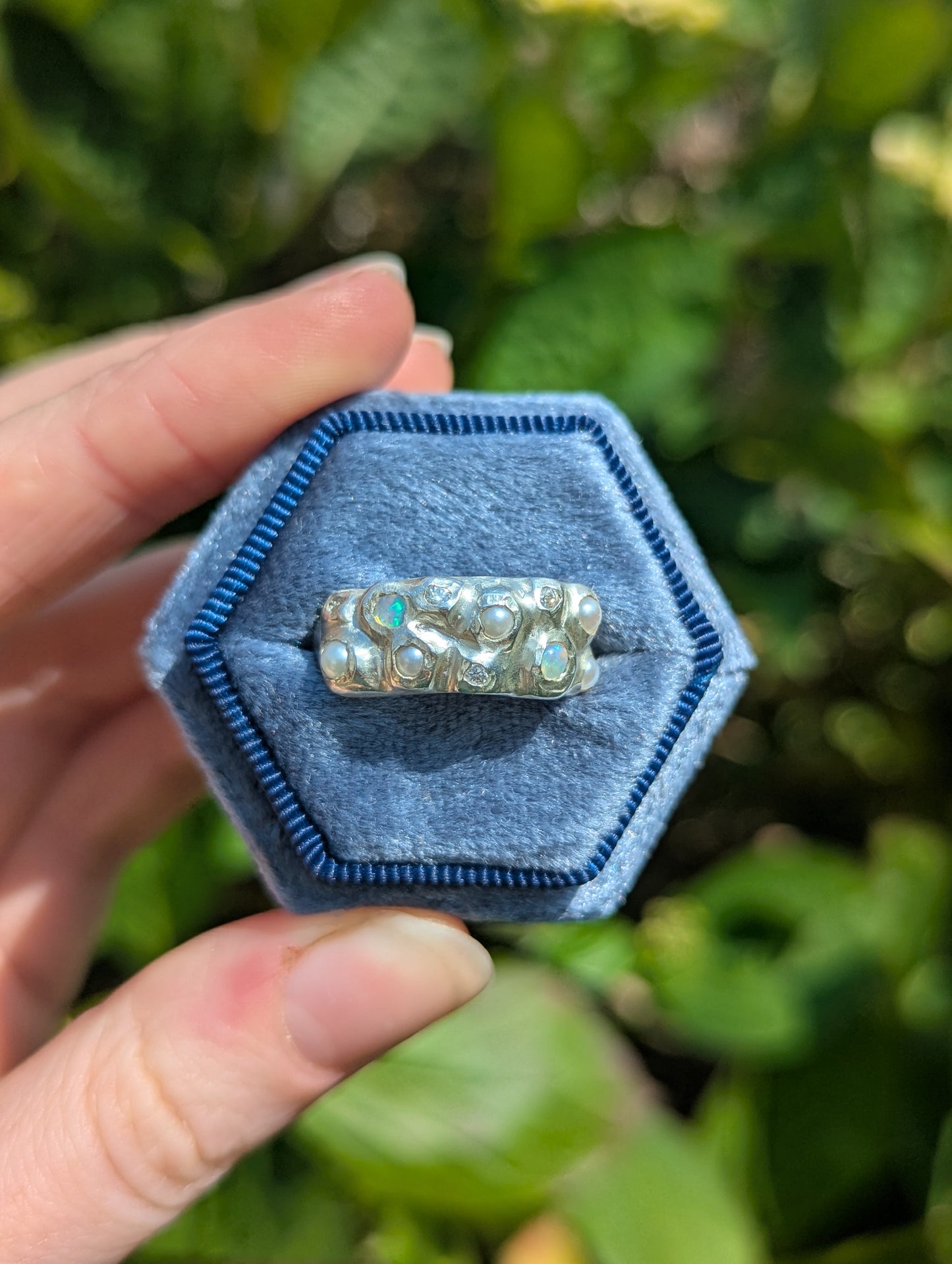 Silver ring with pearls, opals and moissanites in blue box