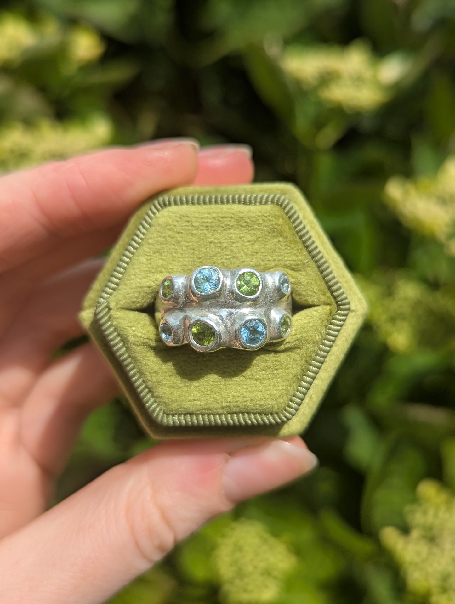 Dreamy silver handmade ring with blue and green gemstones in green box