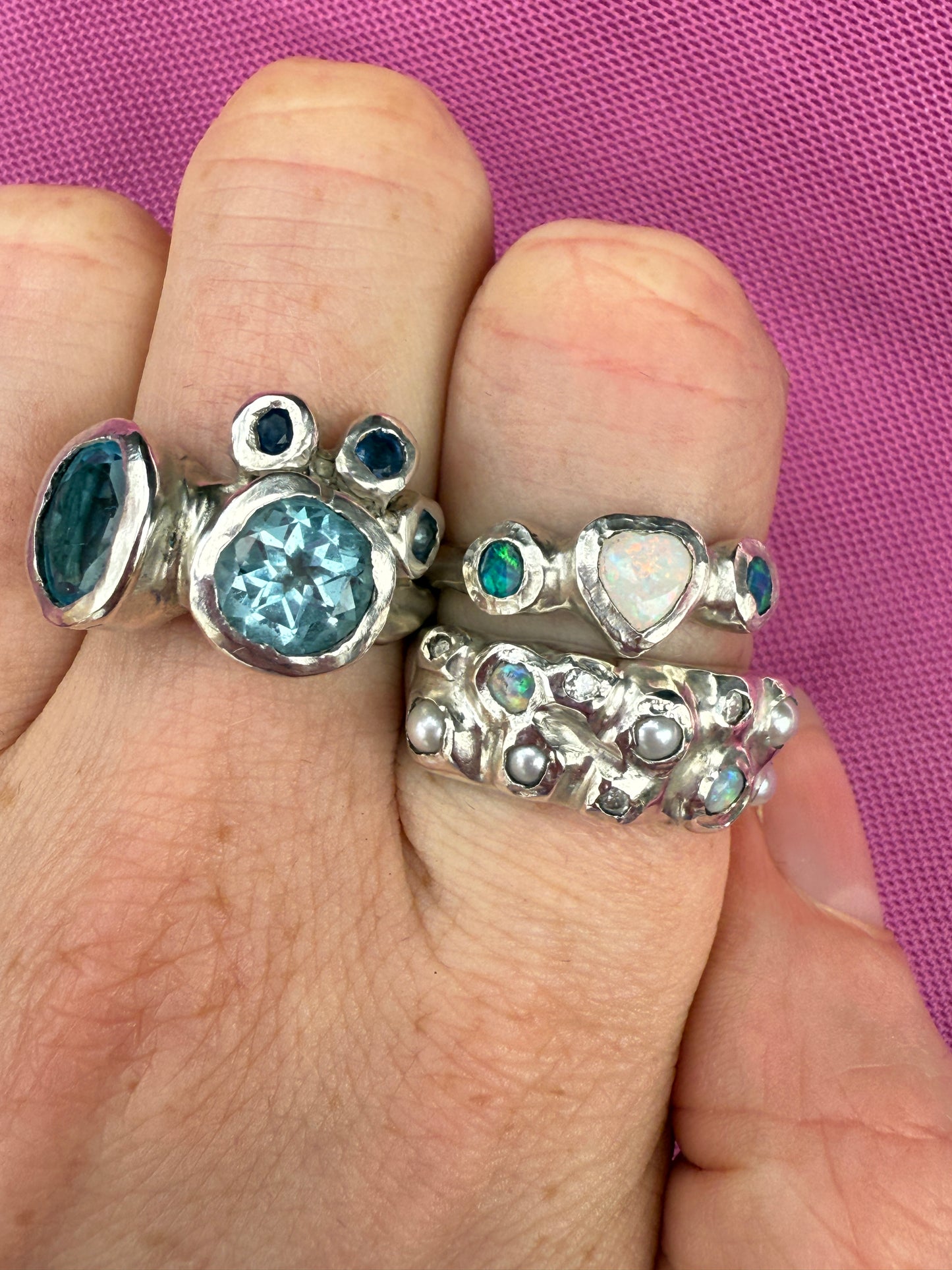 Silver rings with blue gemstones, opals and pearls