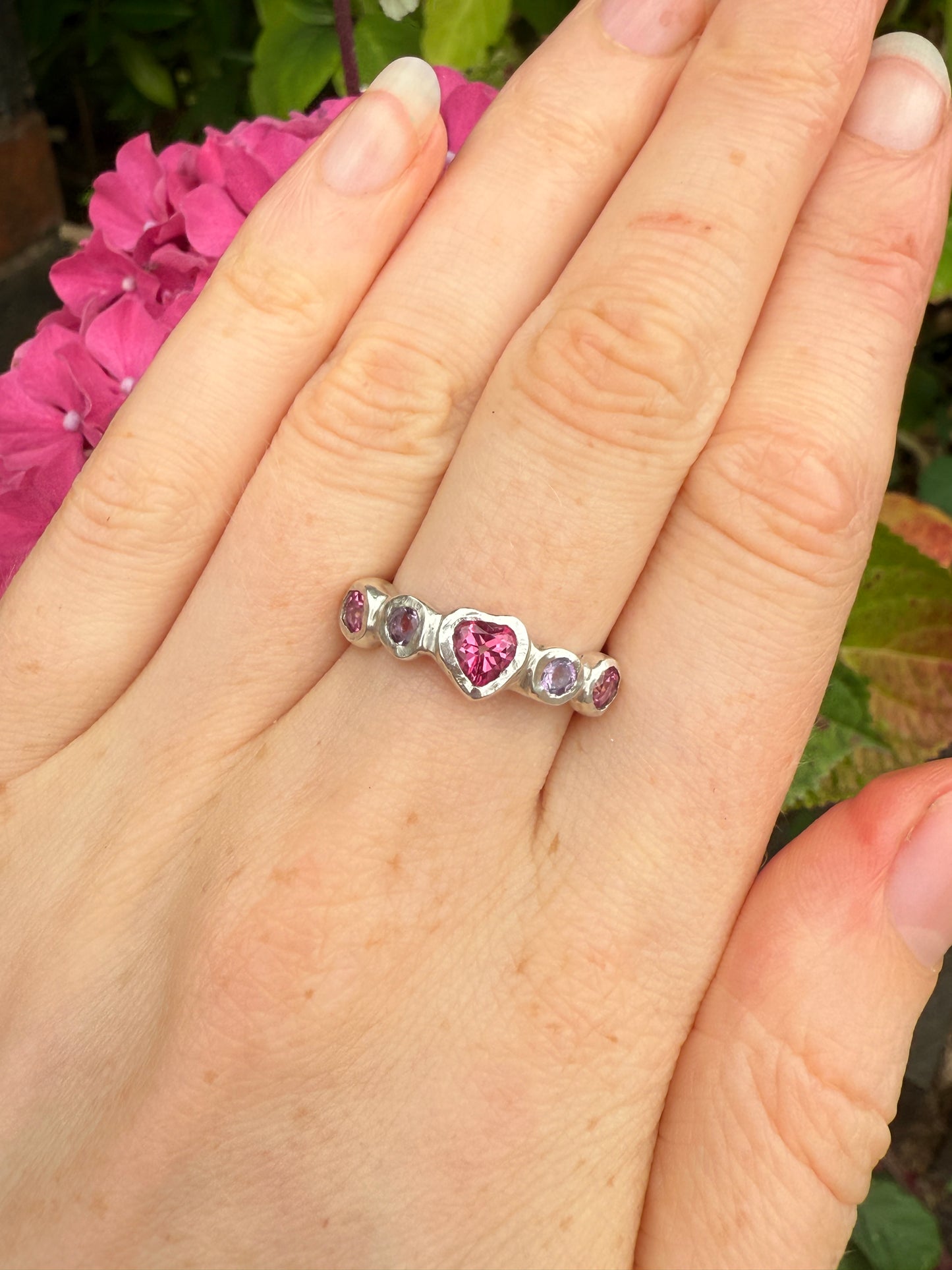 Silver pink and purple gemstone ring with pink heart shaped gemstone