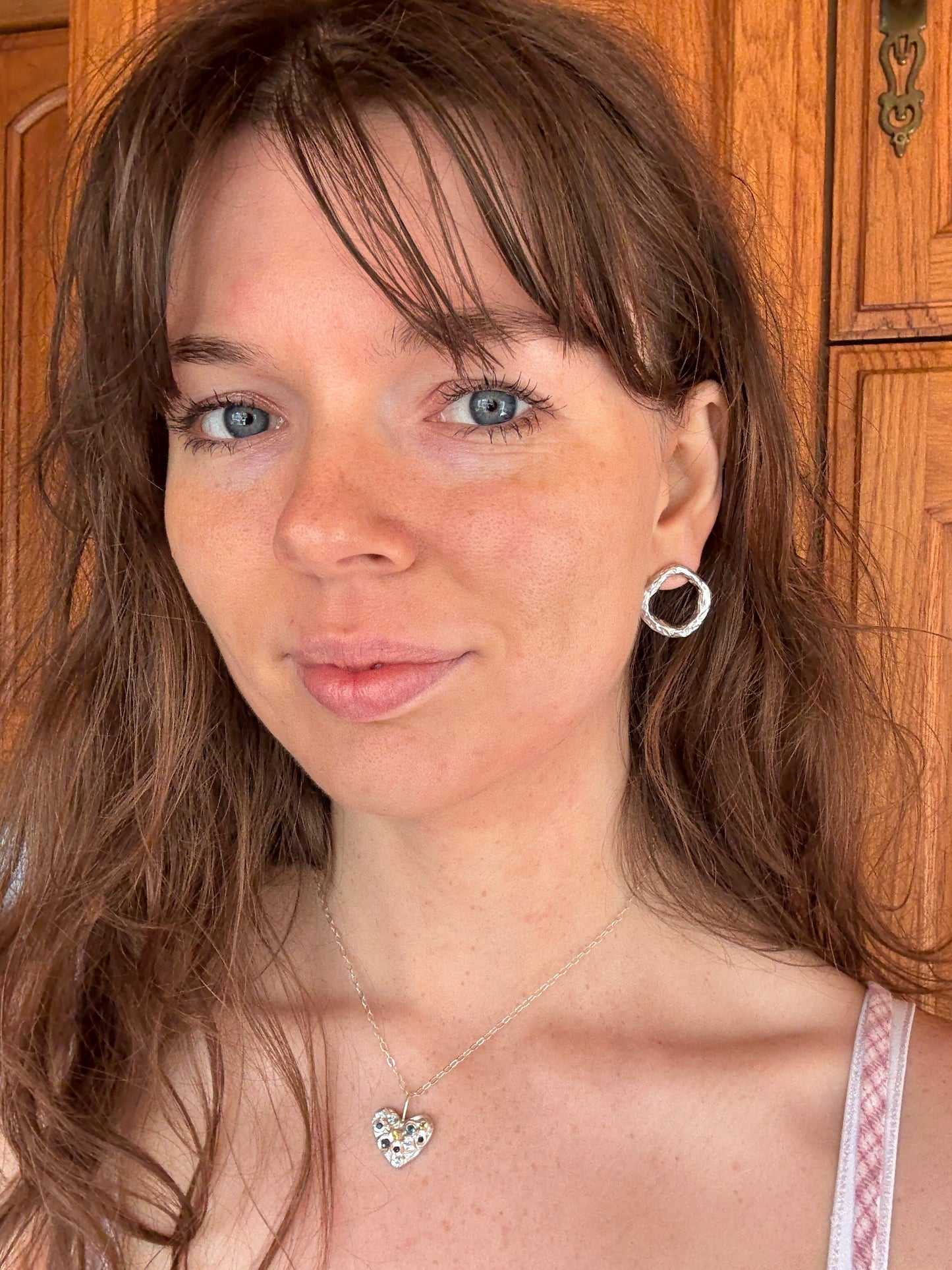Silver Circle Stud Earrings on Woman