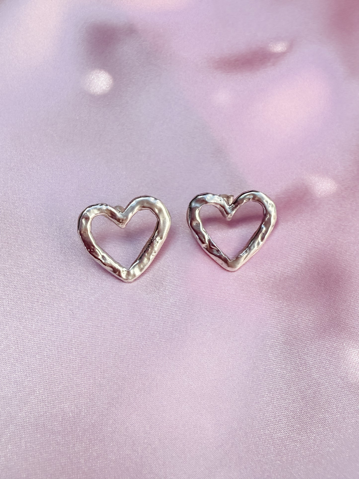 Silver Heart Studs with rippled molten metal texture