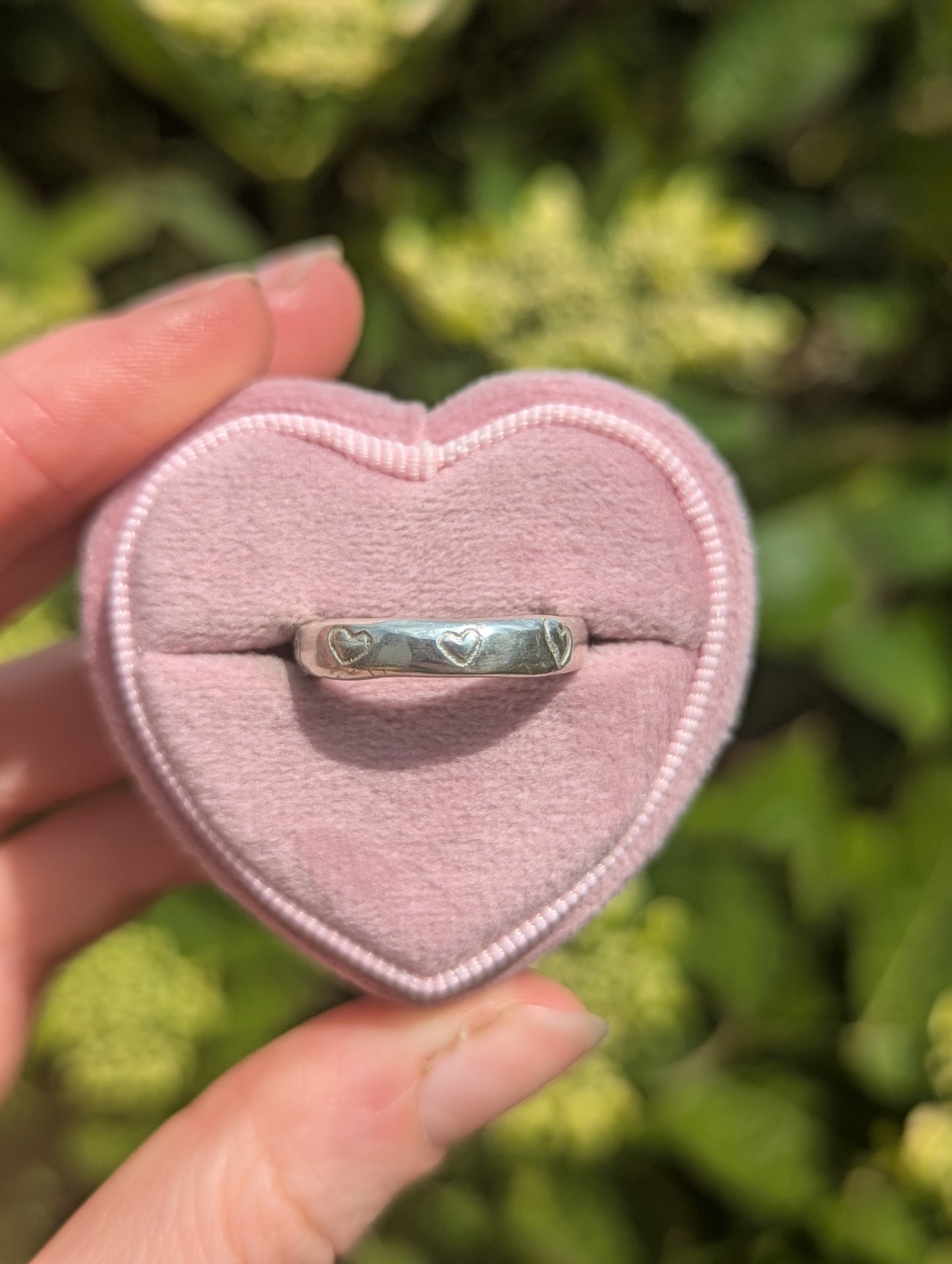 Silver ring with etched hearts in pink heart shaped box