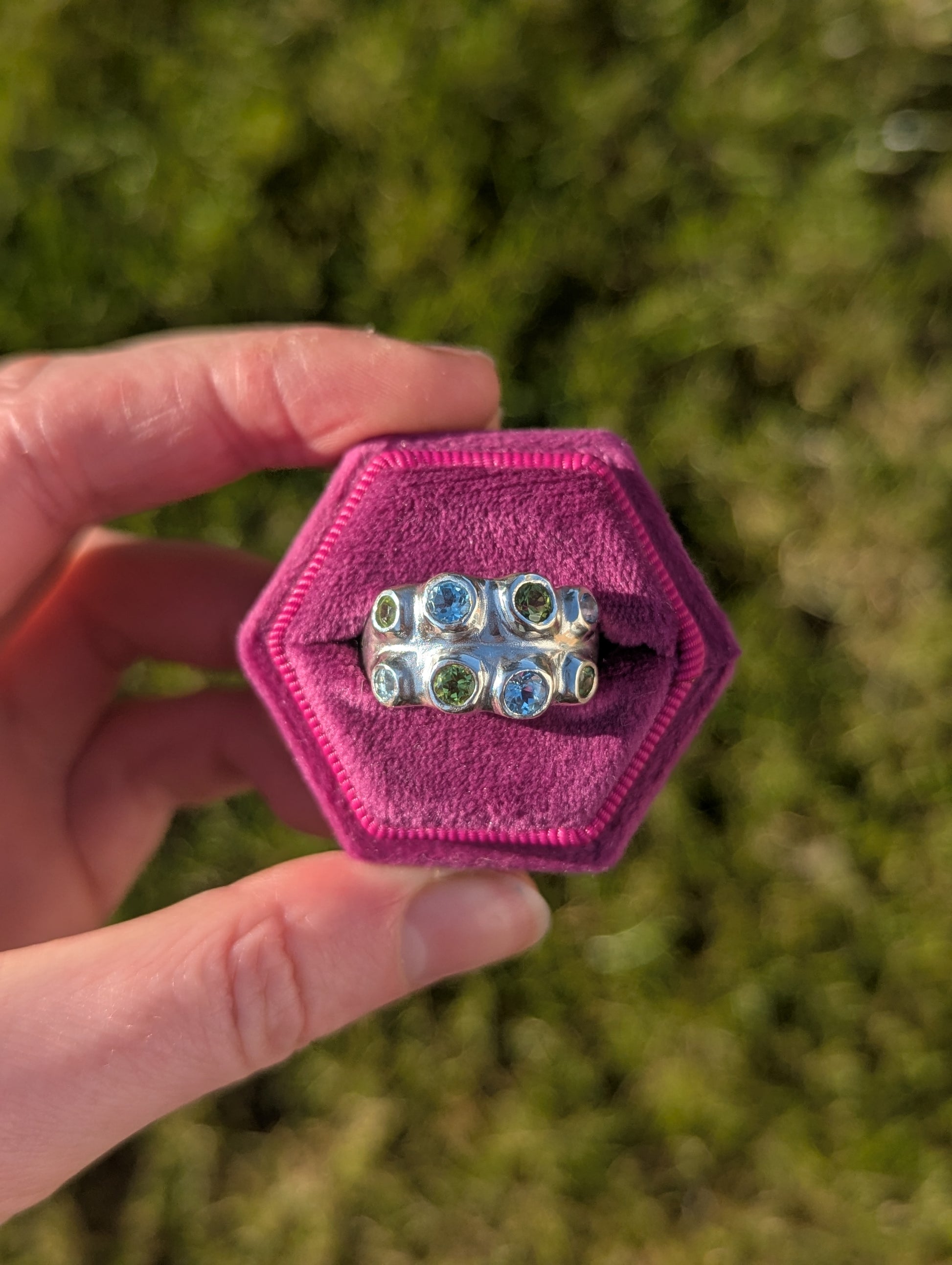 Blue_topaz_and_peridot_recycled_silver_ring