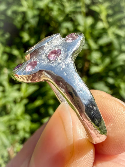 Close up of Cushion cut peach morganite pink tourmaline handmade silver ring showing sand cast ring shank
