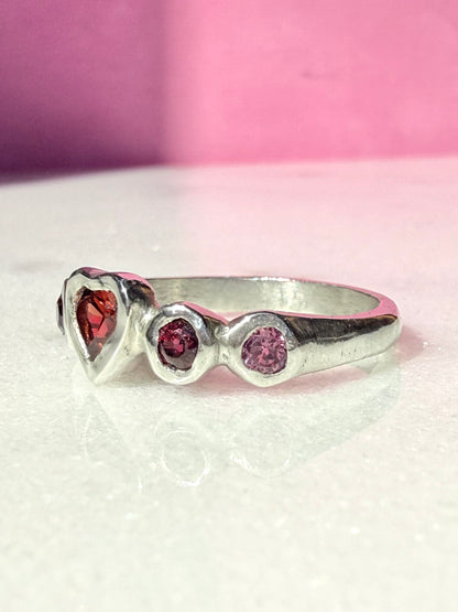 Garnet heart, rhodolite garnet, and pink tourmaline handmade silver ring side view 2
