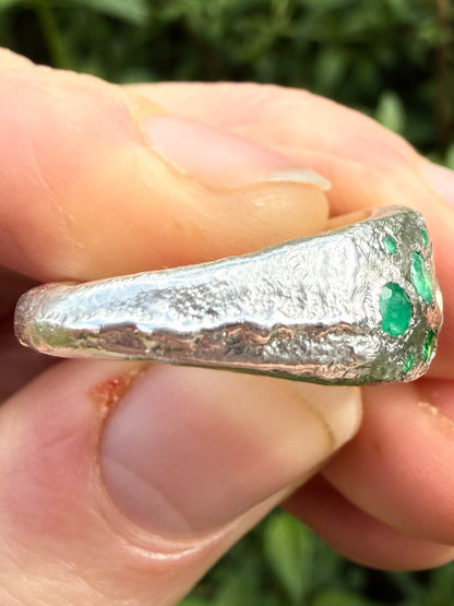 Green sapphire, emerald, tsavorite garnet and moissanite handmade silver ring close up of sand cast texture 3