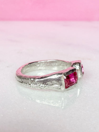 Lab grown octagon ruby and lab grown round pink sapphire handmade silver ring side view 1