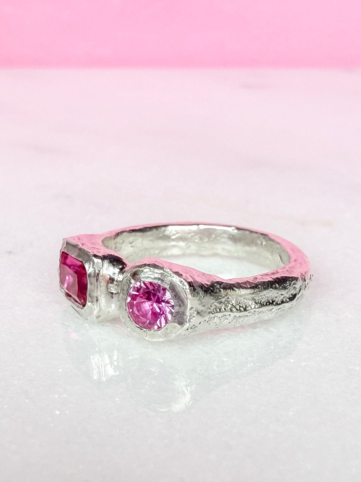 Lab grown octagon ruby and lab grown round pink sapphire handmade silver ring side view 2