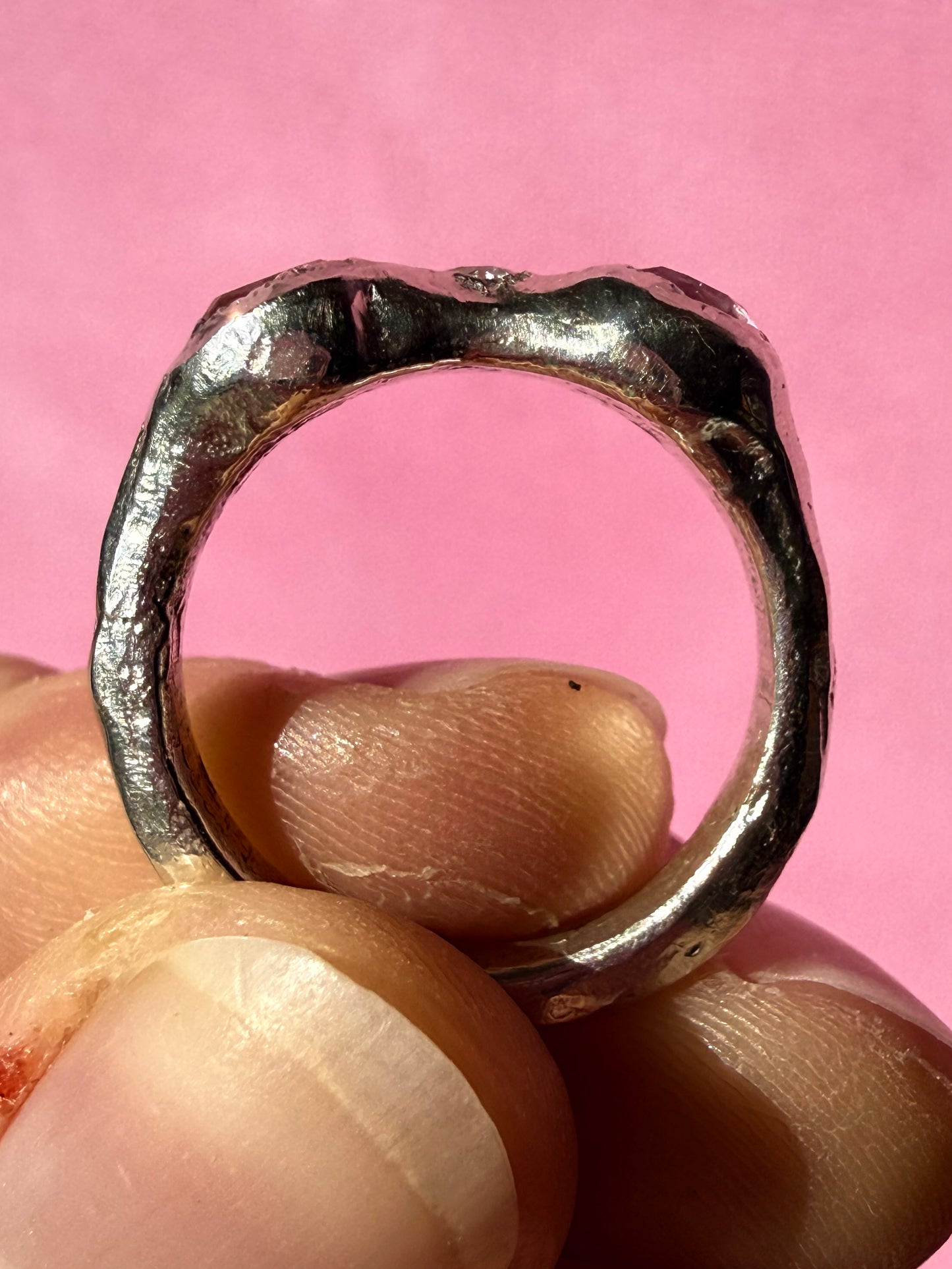 Natural pink tourmaline and lab-grown moissanite handmade silver ring up close ring shank 2