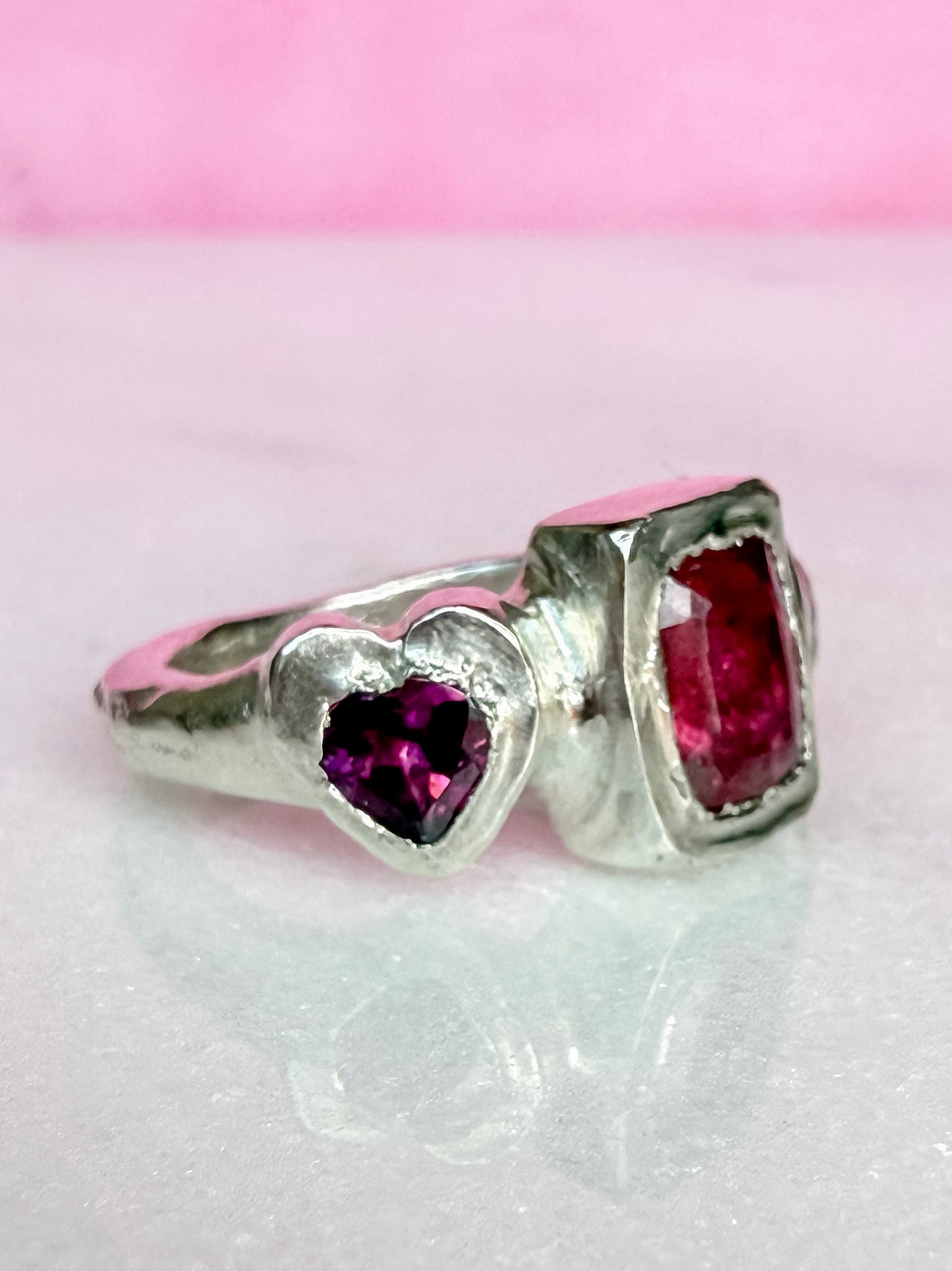 Octagon_cushion_cut_hot_pink_tourmaline_and_purple_rhodolite_heart_handmade_silver_ring_side_view
