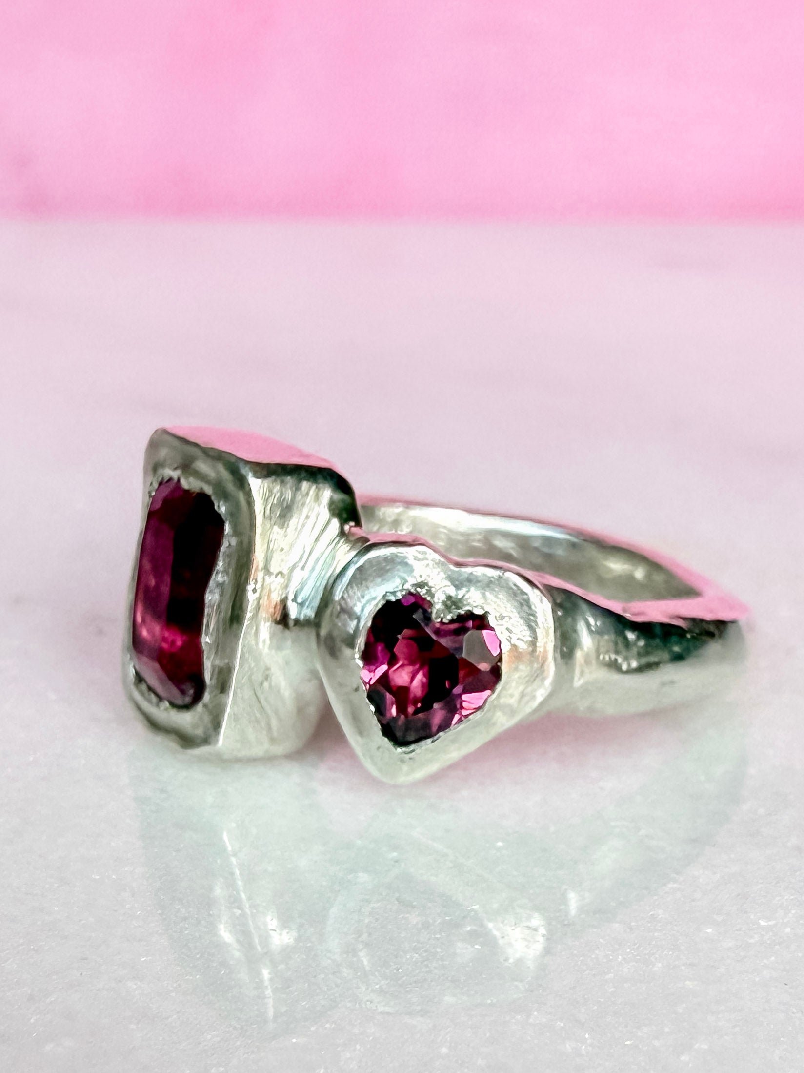 Octagon_cushion_cut_hot_pink_tourmaline_and_purple_rhodolite_heart_handmade_silver_ring_side_view_2