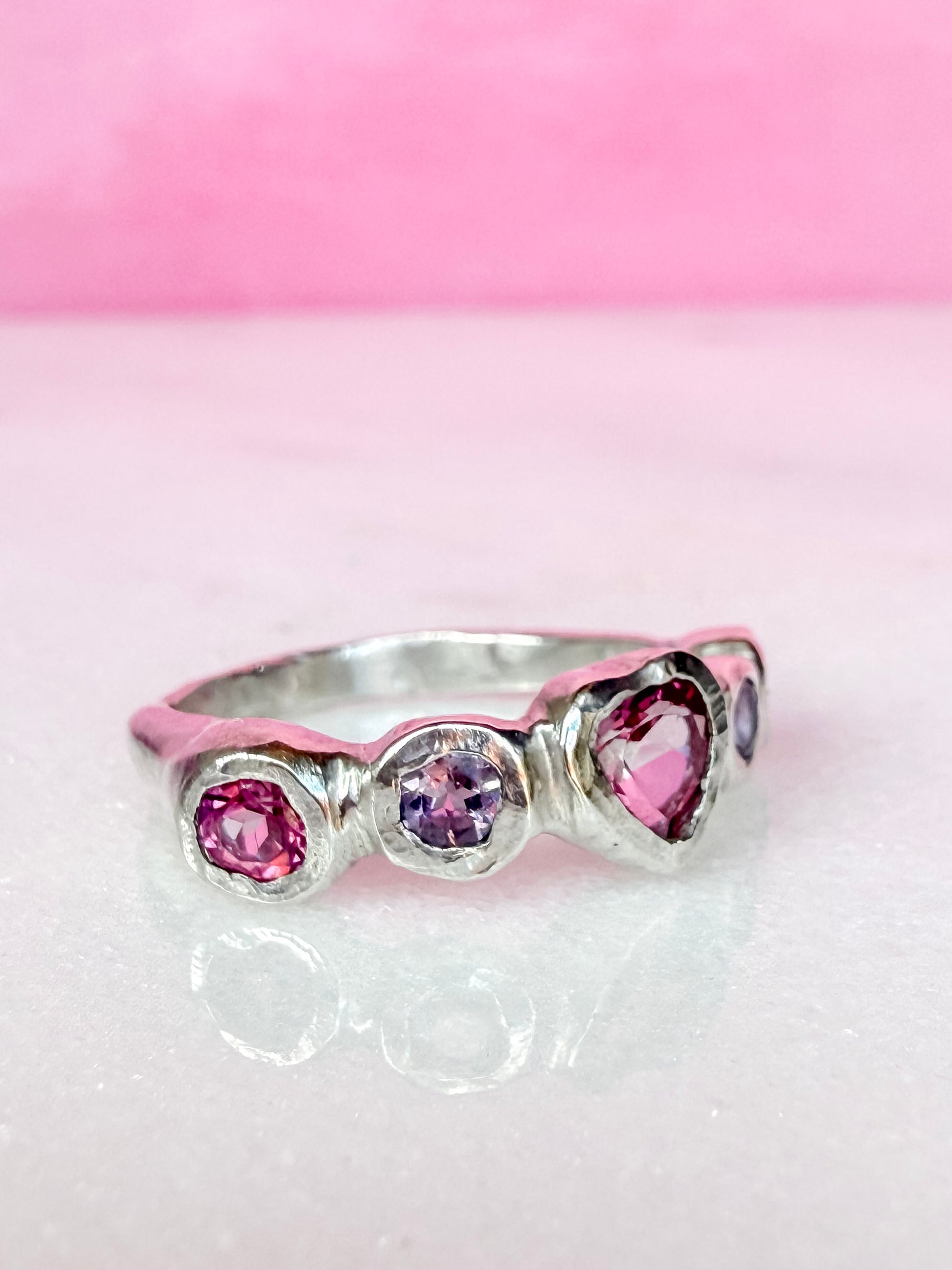 Pink topaz heart, light purple amethyst, and pink topaz handmade silver ring side view 2