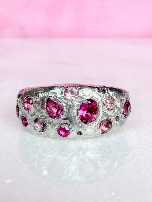 Pink tourmaline, rubelite and ruby handmade silver ring on white background