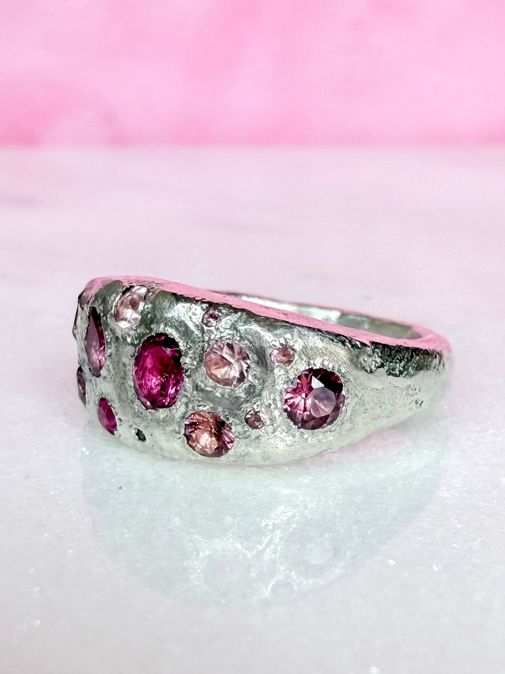 Pink tourmaline, rubelite and ruby handmade silver ring side view