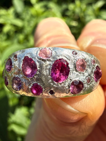 Pink tourmaline, rubelite and ruby handmade silver ring close up of sand cast texture 3