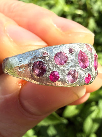 Pink tourmaline, rubelite and ruby handmade silver ring close up of sand cast texture 4