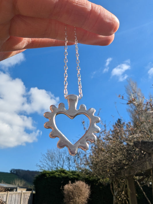 Queen of Hearts Pendant in Sterling Silver Outside Background