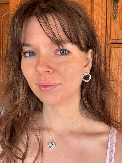 Silver Circle Stud Earrings on Woman 
