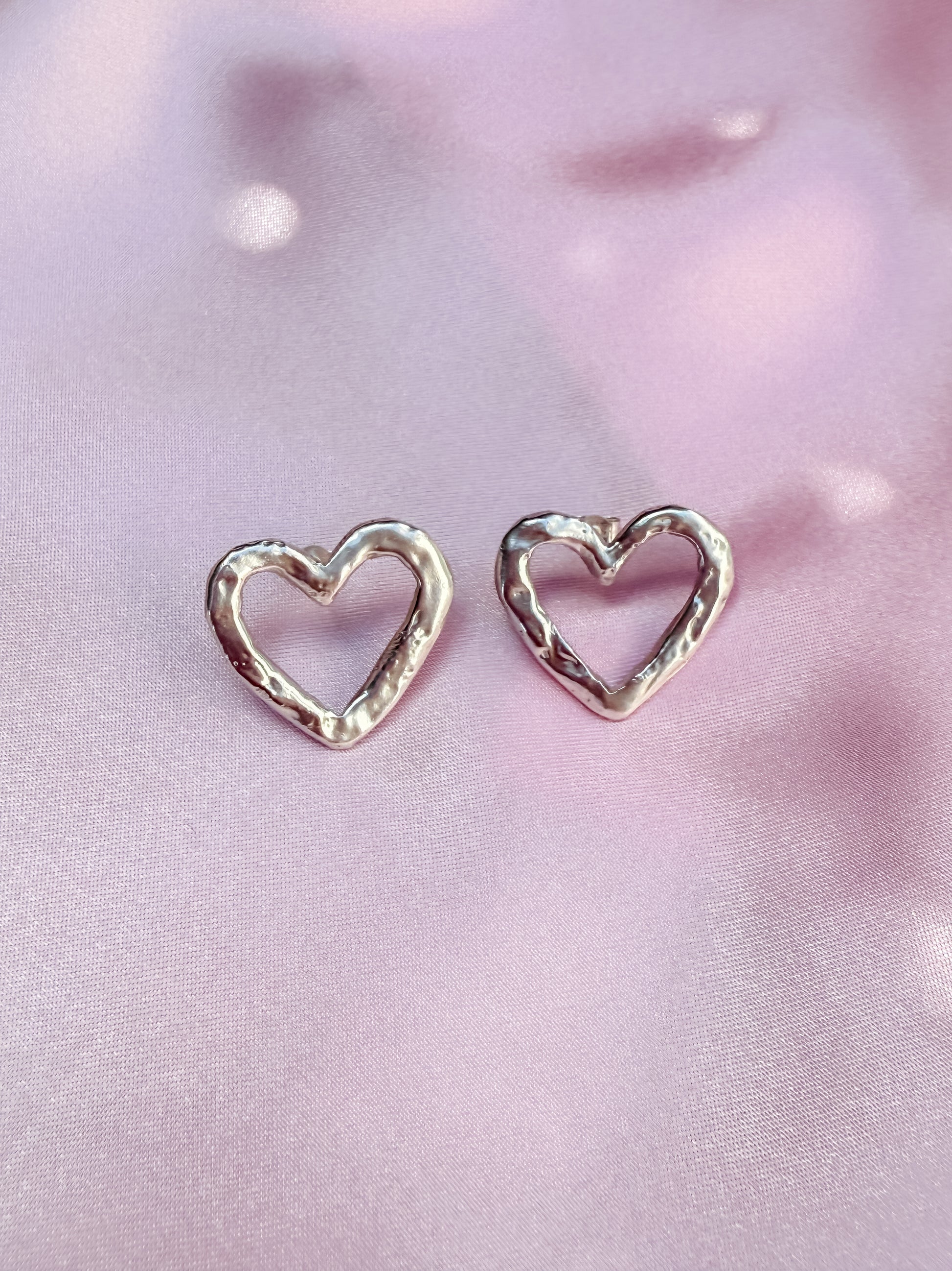 Silver Heart Studs with rippled molten metal texture