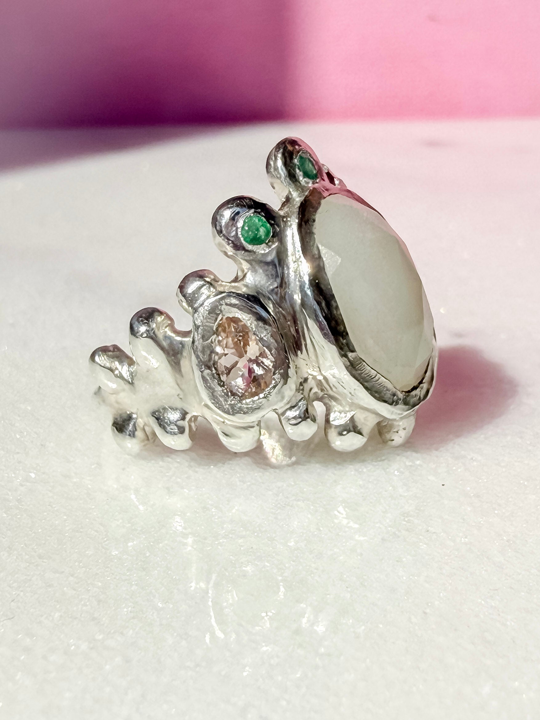 White moonstone slice, peach morganite faceted pear and emerald handmade silver ring side view 1