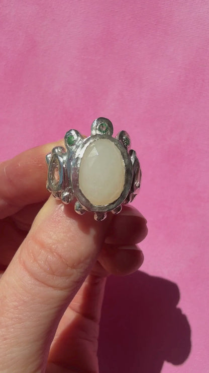 White moonstone slice, peach morganite faceted pear and emerald handmade silver ring video of ring shining in the sun
